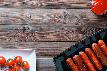 Image showing Sausage roasted on the grill.