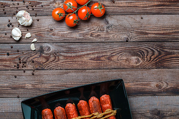 Image showing Sausage roasted on the grill.