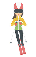 Image showing Young woman skiing.