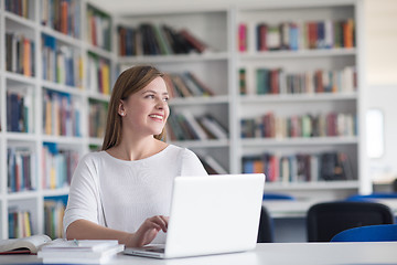 Image showing female student study in school library