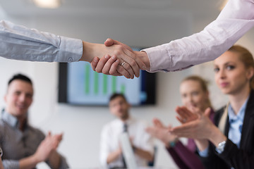 Image showing business womans handshake