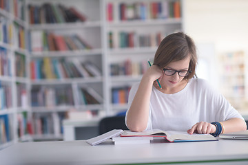 Image showing female student study in school library