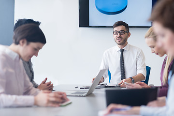 Image showing young business people group on team meeting at modern office