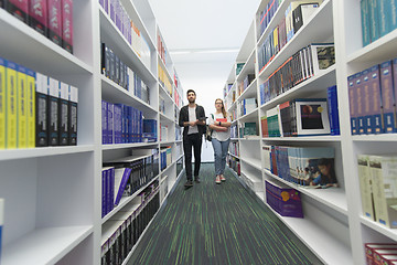 Image showing students group  in school  library