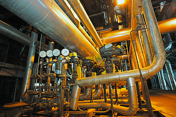 Image showing Equipment, cables and piping as found inside of a modern industr