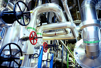 Image showing Equipment, cables and piping as found inside of a modern industr