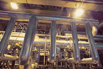 Image showing Equipment, cables and piping as found inside of a modern industr