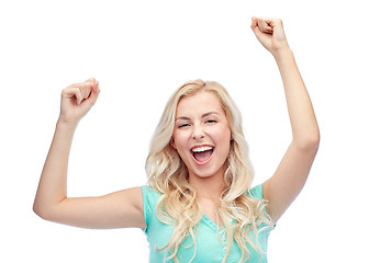 Image showing happy young woman or teen girl celebrating victory