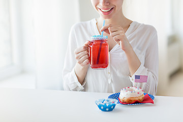 Image showing happy woman celebrating american independence day