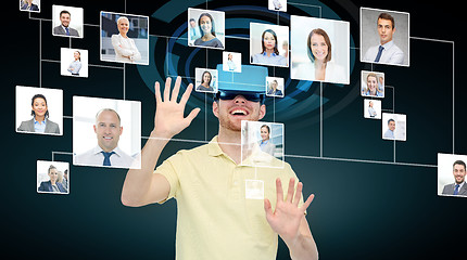 Image showing happy man in virtual reality headset or 3d glasses