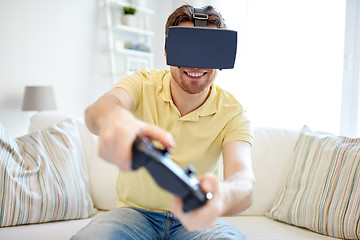 Image showing man in virtual reality headset with controller