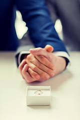 Image showing close up of male gay couple and wedding rings