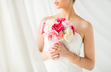 Image showing close up of woman or bride with flower bouquet