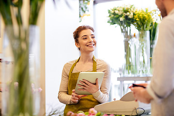 Image showing florist woman and man making order at flower shop