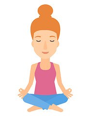 Image showing Woman meditating in lotus pose.