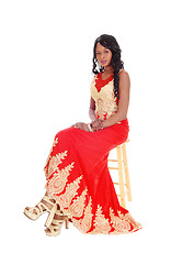 Image showing African American woman in a red dress.