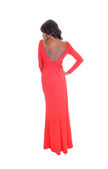 Image showing African American woman red long dress from back.