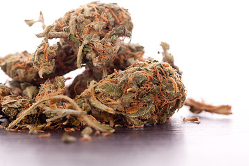 Image showing Close up Dried Marijuana Leaves on the Table