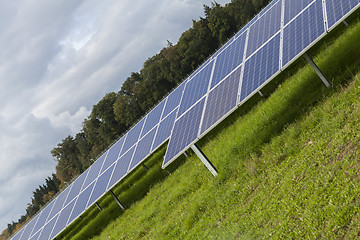 Image showing Field with blue siliciom solar cells alternative energy