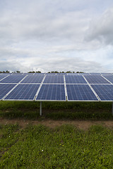 Image showing Field with blue siliciom solar cells alternative energy