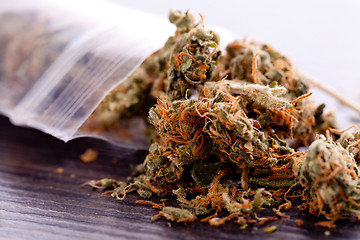 Image showing Close up Dried Marijuana Leaves on the Table