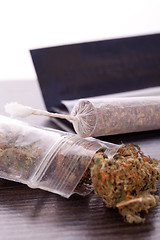 Image showing Dried Cannabis on Rolling Paper with Filter