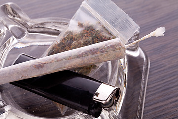 Image showing Close up of marijuana and smoking paraphernalia