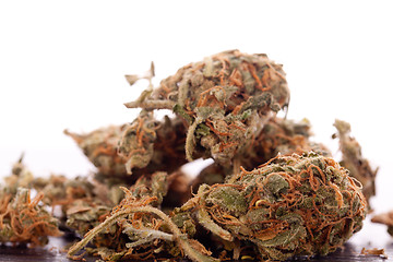 Image showing Close up Dried Marijuana Leaves on the Table