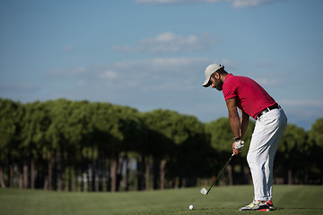 Image showing golf player hitting long shot