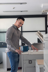 Image showing young  business man copy documents