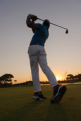 Image showing golfer hitting long shot