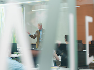 Image showing senior teacher and students group in computer lab classroom