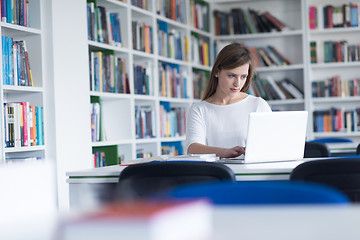 Image showing female student study in school library