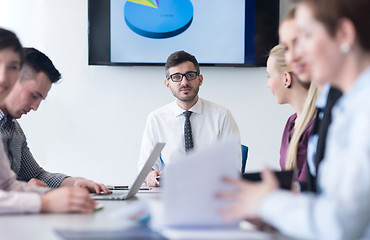 Image showing young business people group on team meeting at modern office