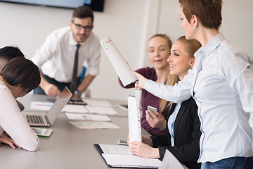 Image showing young business people group on team meeting at modern office