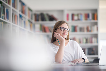 Image showing female student study in school library