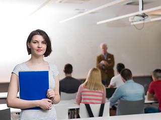 Image showing portrait of happy female student in classroom