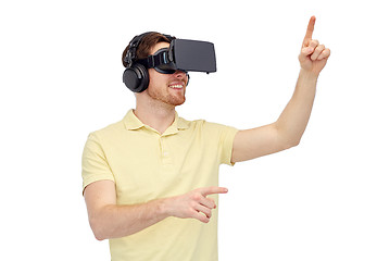 Image showing happy man in virtual reality headset or 3d glasses