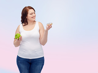 Image showing happy plus size woman choosing apple or donut