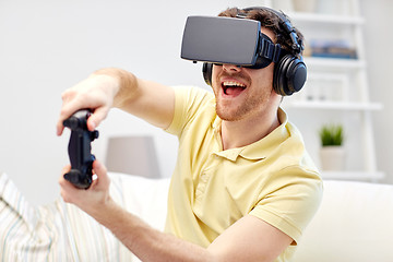 Image showing man in virtual reality headset with controller