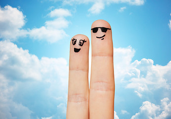 Image showing close up of two fingers with smiley faces