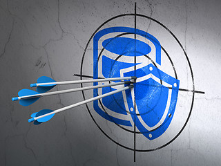 Image showing Programming concept: arrows in Database With Shield target on wall background