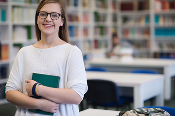 Image showing portrait of female student in library