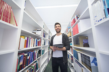 Image showing student with tablet in library