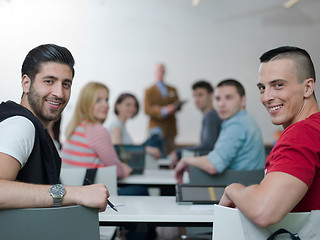 Image showing teacher with a group of students in classroom