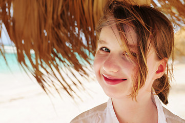 Image showing Young girl on tropical beach