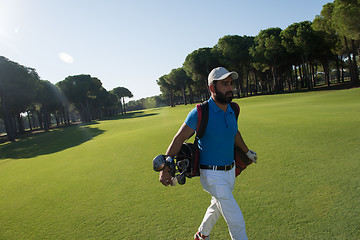 Image showing golf player walking