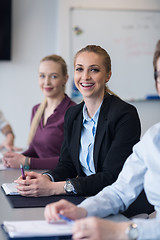 Image showing young business people group on team meeting at modern office