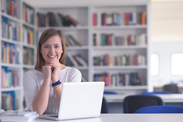 Image showing female student study in school library