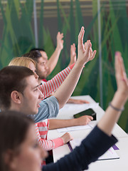 Image showing students group raise hands up on class